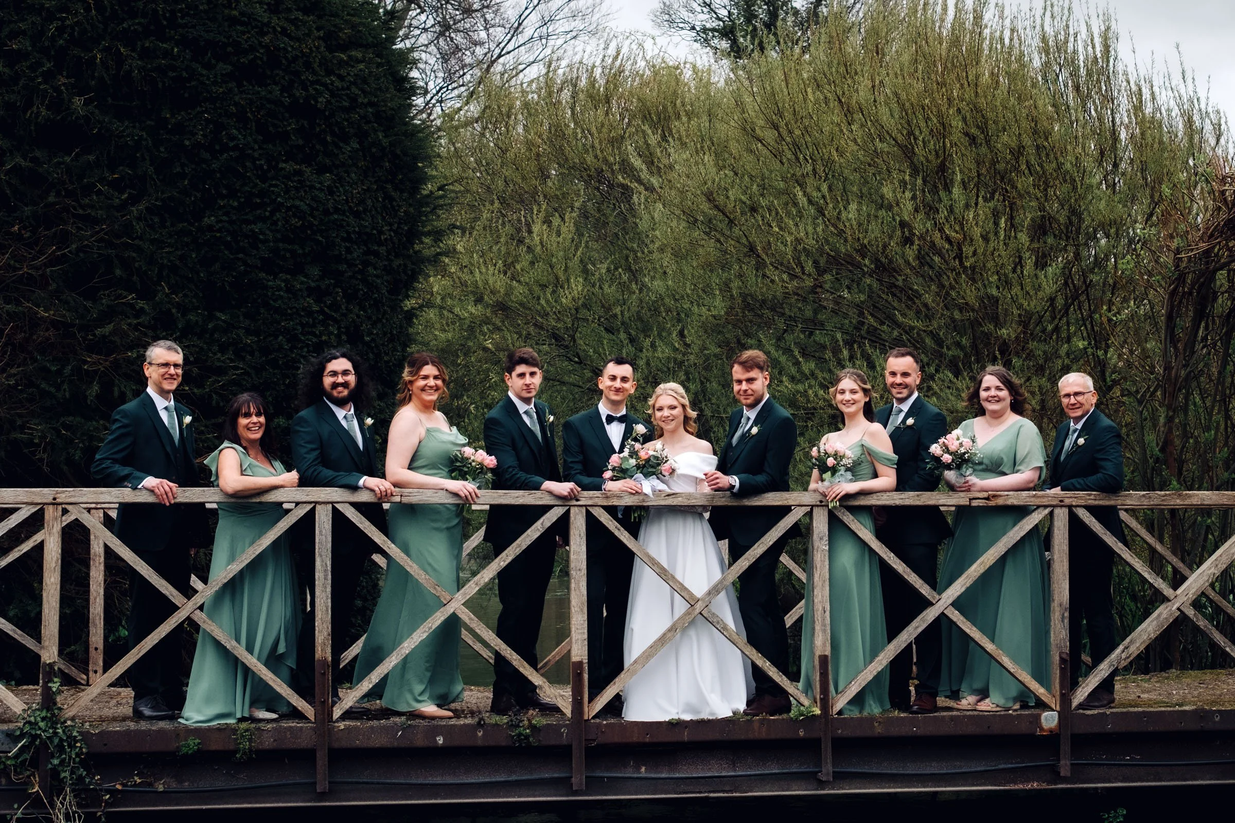 Manor Estate weddings with the bridal party on the bridge