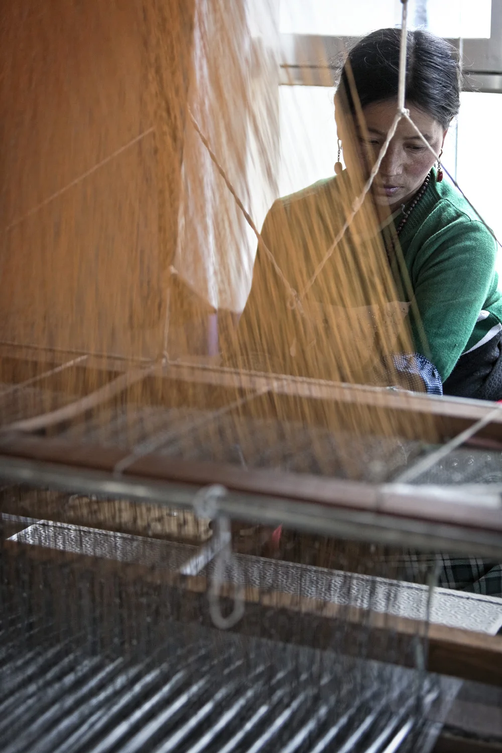 Weaving in the workshop at Norlha Textiles, Ritoma, Amdo, Tibet