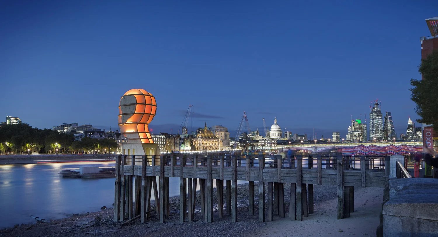Light sculpture, "Head Above Water" by Steuart Padwick on the Oxo Tower pier, South Bank, London. Interactive lighting installation by Hoare Lea Lighting. The sculpture supports Time to Change's campaign to remove the stigma of mental illness.