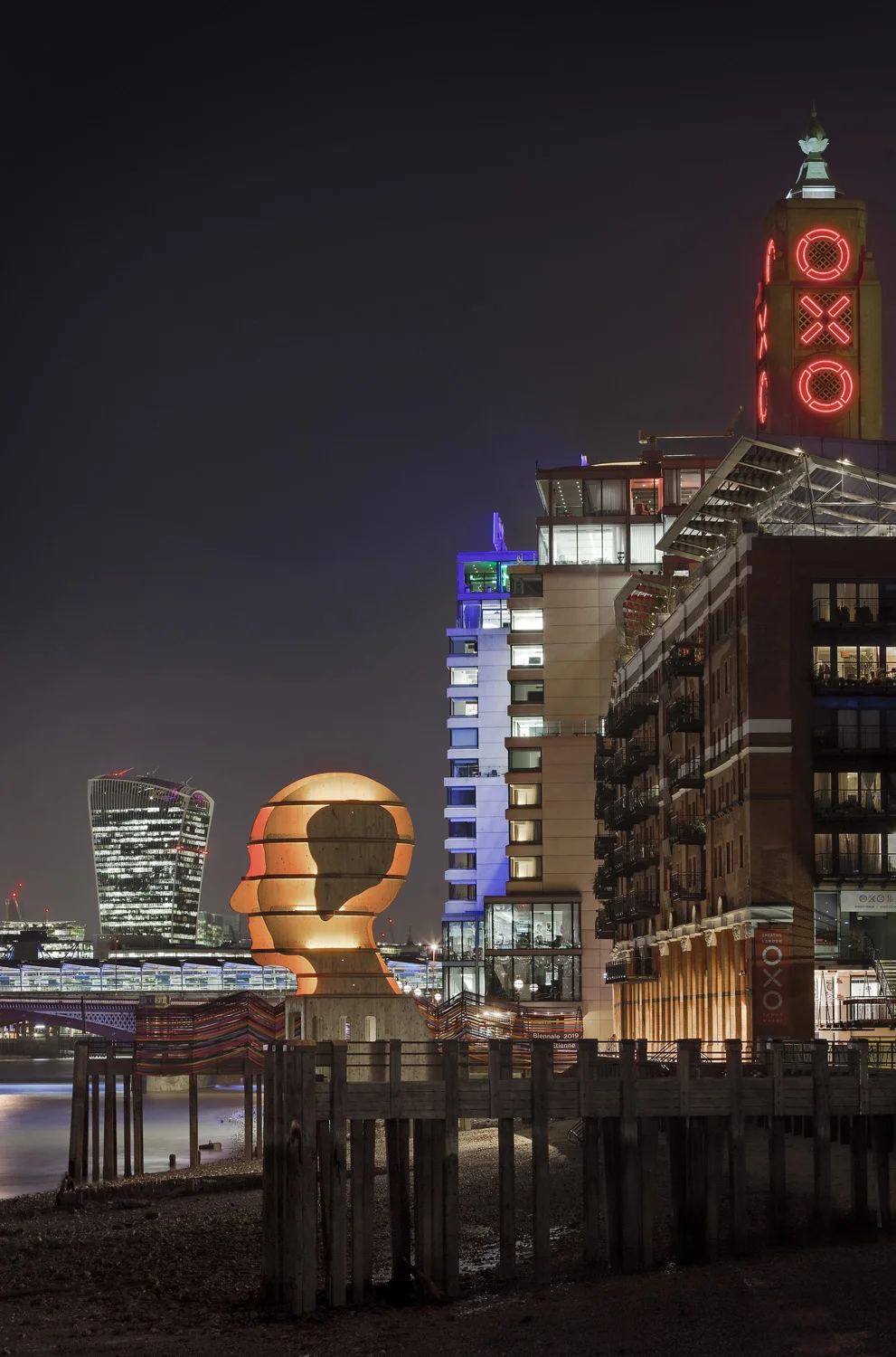 Light sculpture, "Head Above Water" by Steuart Padwick on the Oxo Tower pier, South Bank, London. Interactive lighting installation by Hoare Lea Lighting. The sculpture supports Time to Change's campaign to remove the stigma of mental illness.