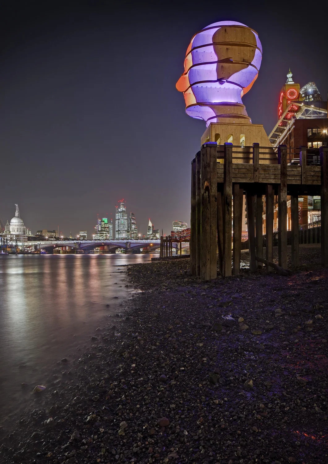 Light sculpture, "Head Above Water" by Steuart Padwick on the Oxo Tower pier, South Bank, London. Interactive lighting installation by Hoare Lea Lighting. The sculpture supports Time to Change's campaign to remove the stigma of mental illness.