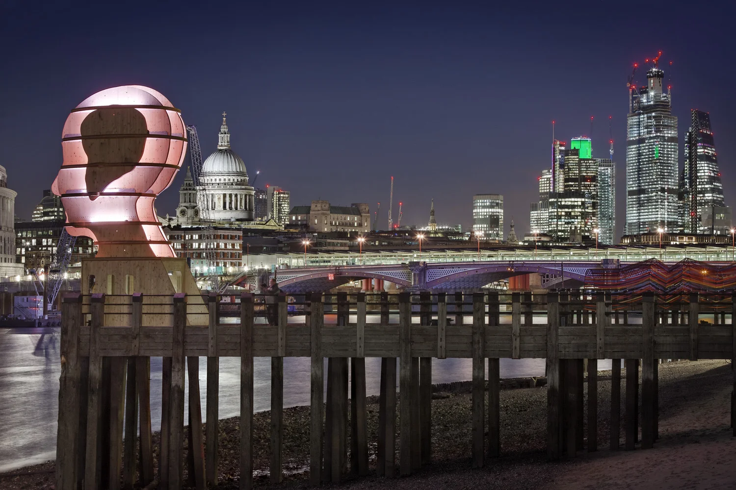 Light sculpture, "Head Above Water" by Steuart Padwick on the Oxo Tower pier, South Bank, London. Interactive lighting installation by Hoare Lea Lighting. The sculpture supports Time to Change's campaign to remove the stigma of mental illness.