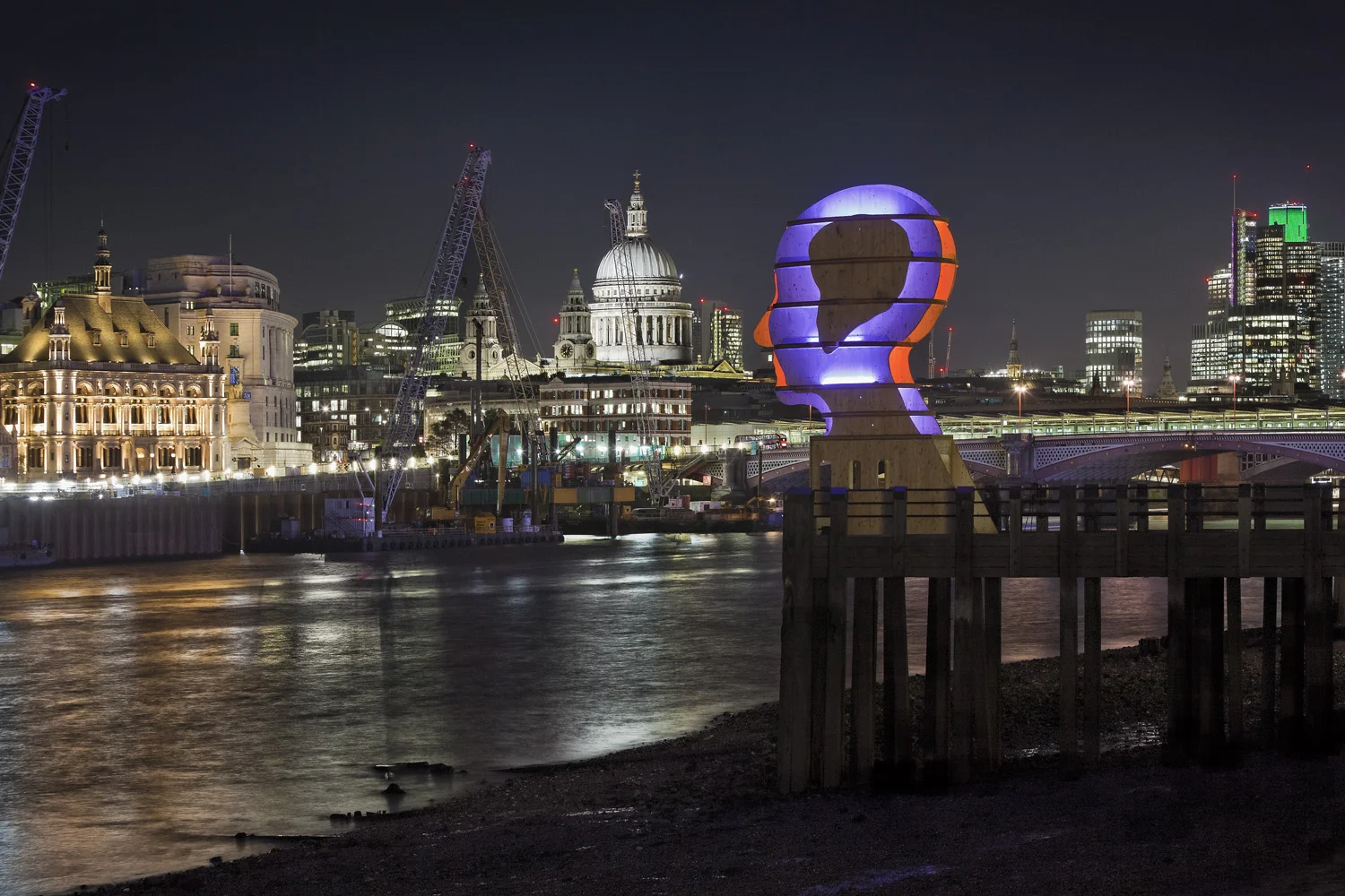 Light sculpture, "Head Above Water" by Steuart Padwick on the Oxo Tower pier, South Bank, London. Interactive lighting installation by Hoare Lea Lighting. The sculpture supports Time to Change's campaign to remove the stigma of mental illness.