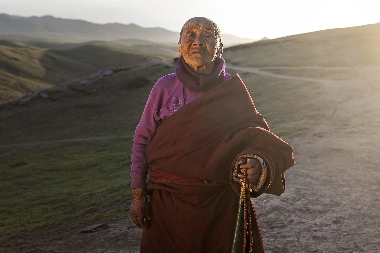 Nun wearing Norlha. Ritoma, Amdo, Tibet