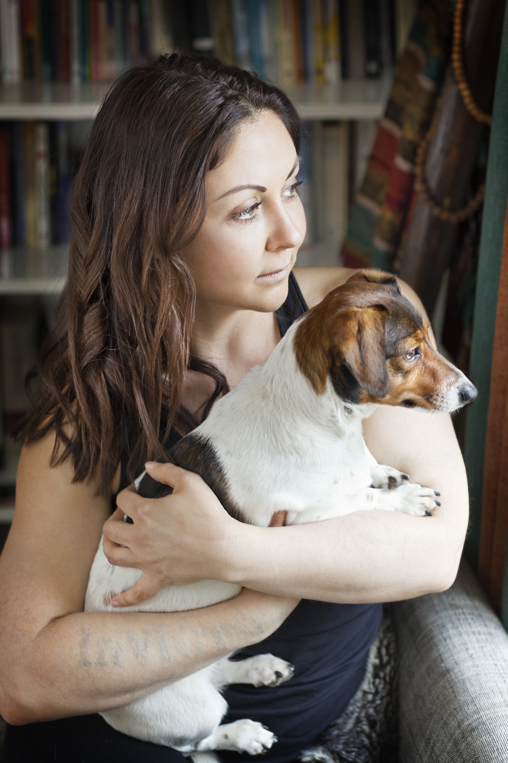  Portrait of yoga instructor Anastasia Cambitzi and her dog at her home in Oxfordshire. 