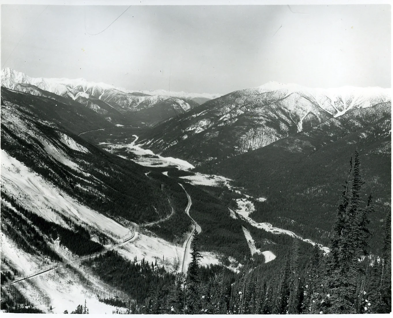 PSA.5 East side Rogers Pass. Beaver Valley with original railway line. Mar. 1958