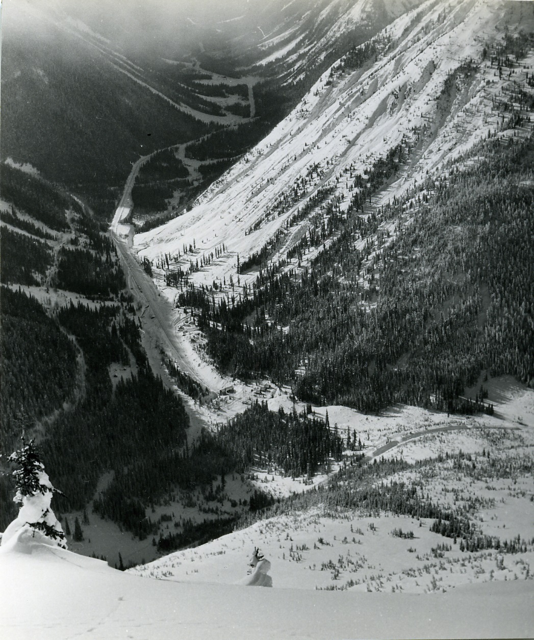 PSA.8 View from avalanche crest to Glacier with west portal of Connaught Tunnel. Feb. 1957