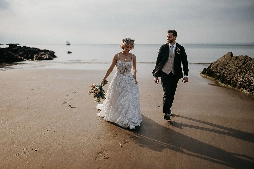 A little beach stroll with K/E at @polhawnfort 
#cornwallweddingphotographer #devonweddingphotographer #documentaryweddingphotography