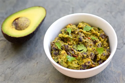 Spicy Black Bean Guacamole Tasting Page Serve with pita or tortilla chips. spicy black bean guacamole tasting page