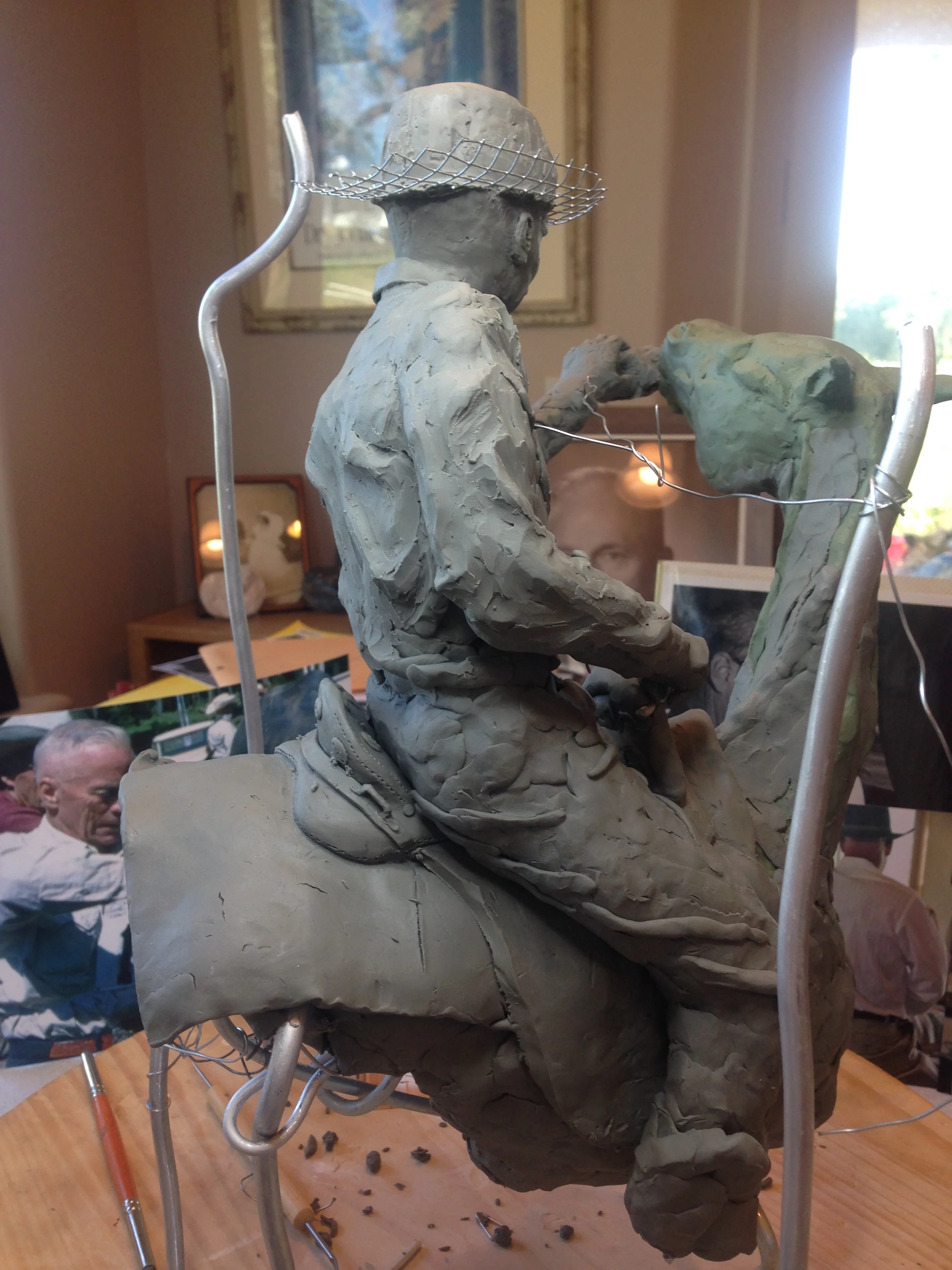 The hardware was originally done in clay, then I did it in solder wire. After the foundry did the mold, those pieces were taken off (or came out in the wax mold poorly) so they will be fabricated on the final piece.
