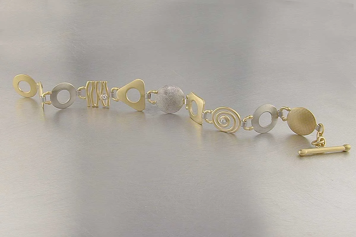 Style #22310042: Lightweight Yellow & White Gold Geometric Link "Parts" Bracelet w/ Diamonds