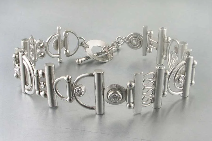 Style #22310024: Platinum & Diamond "Parts" Bracelet