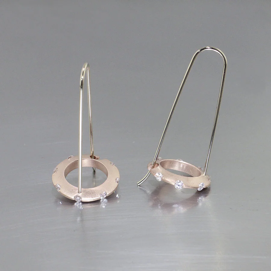 Item #22110524 - 14kt rose and white gold diamond earrings
