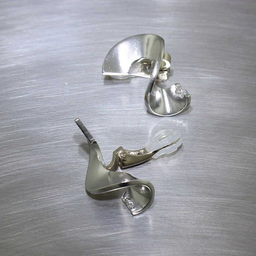 Item #22110528: Twisting Sheet Diamond Earrings with Clip Backs, Palladium