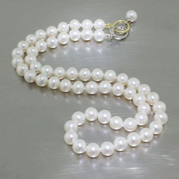 Item #25010133: Strand of Natural White Freshwater Pearls, 18" including Two-Tone 18KY/14KW Gold Clip Clasp