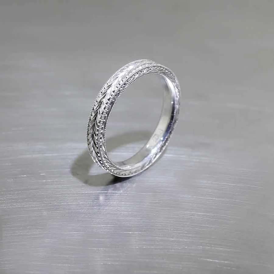 Style #21010119: Hand-Engraved 3mm Platinum Band