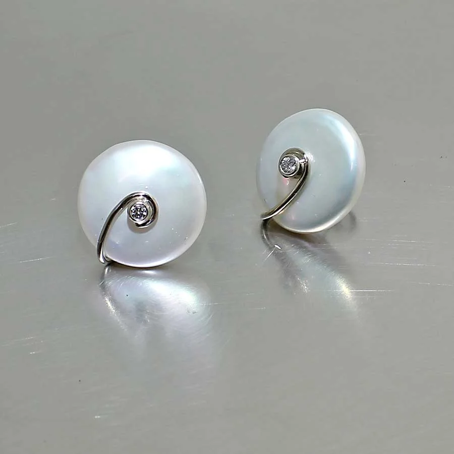Style #24710086: LUSTROUS, COIN SHAPE FRESHWATER PEARLS AND BEZEL SET DIAMONDS SET IN 14K WHITE GOLD STUD EARRINGS