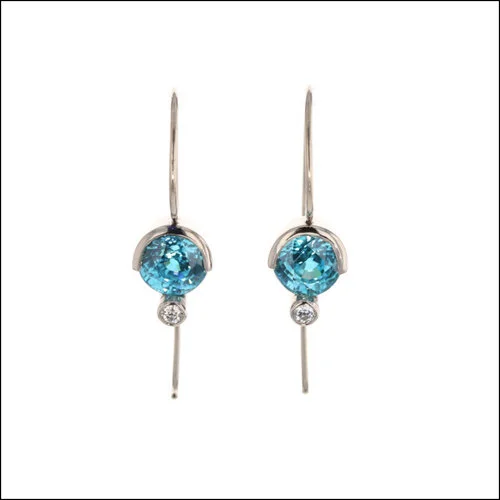 Style #23311113 Blue Zircon Partial Bezel Set 14KW Earrings with Diamond Accents