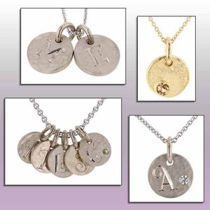 round mother's charms, some with engraved initial, some with birthstones and some with both