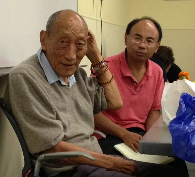 Khyongla Rato Rinpoche (left) teaching at the Tibet Center, with Tenzin Gelek translating. August 26, 2013. Photo by Jane L. Wechsler
