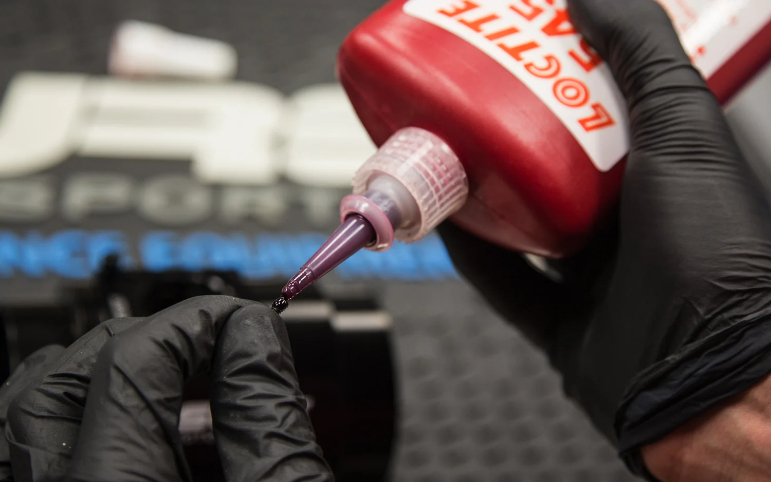 Purple Loctite 545 is used to seal the bolts of the MAF housing.