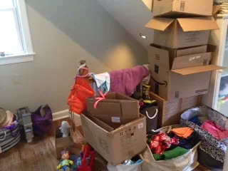 This. This is actually my genius plan to get rid of half of the crap we own so we can spend half as much time cleaning (or stressing about cleaning). Unfortunately, these boxes have been here, waiting to be filled and donated, for longer than I care to confess.
