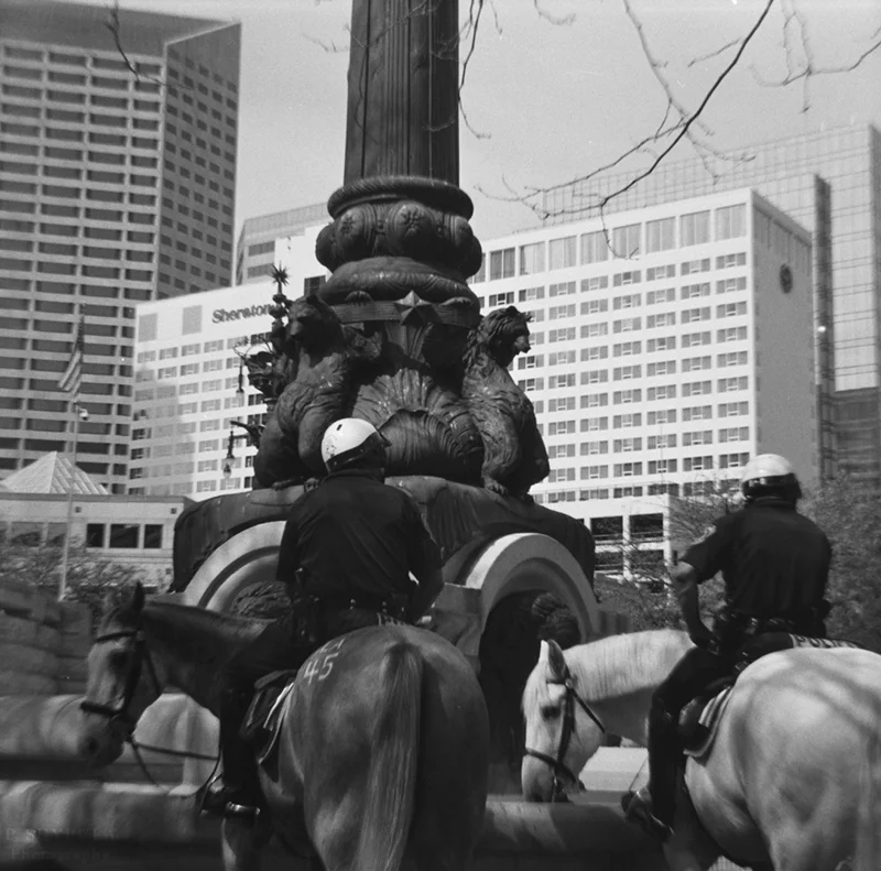 Cops patrolling on horseback around Monument Circle Diana F+