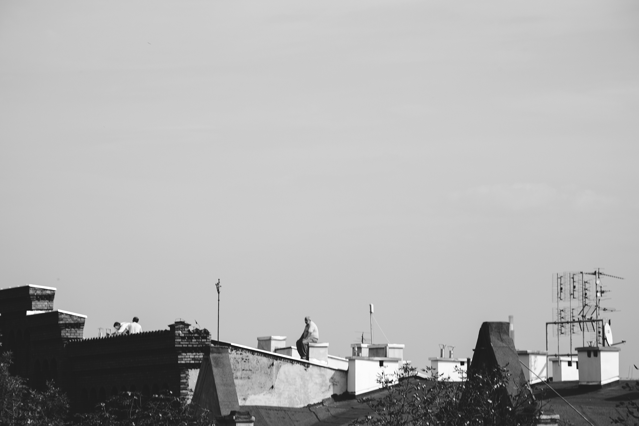 Roof workers in Krakow