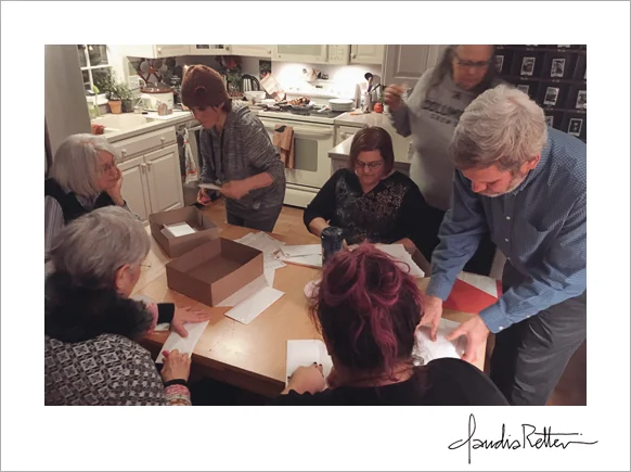 The Magpie Consort stuffing envelopes
