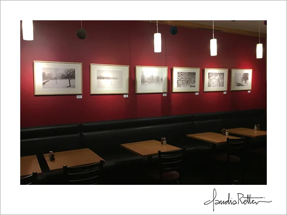 Velvet Winter on the red wall at the Meadowlark Restaurant.