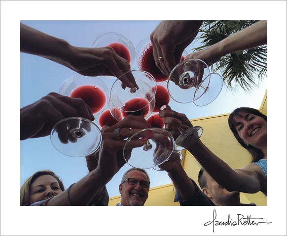 Clinking wine glasses