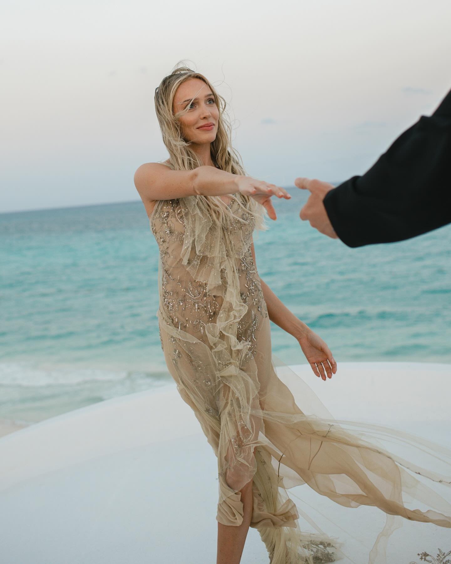 Night two of @alexandracooper and Matt Kaplan&rsquo;s wedding was held along the shores of the Riviera Maya. Heartfelt toasts, s&rsquo;mores on the beach and a vintage Donna Karan number made for a memorable evening. See the full feature in @voguewed