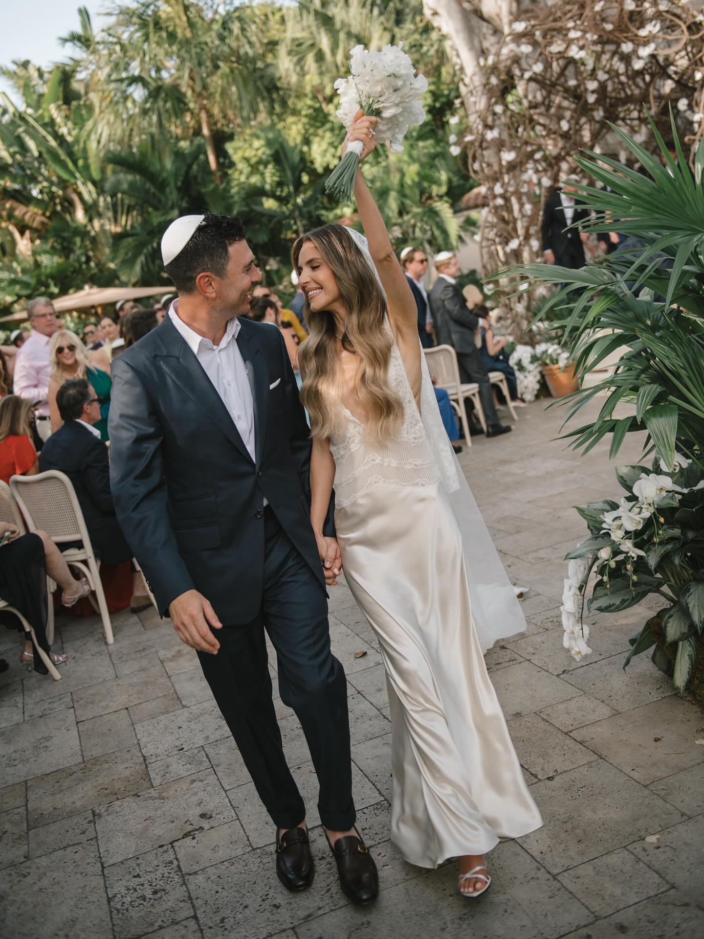 Ari and Valerie were married on Fisher Island &mdash; the same place where Ari first called her his girlfriend, and now, his wife. Their ceremony beneath the banyan tree was intimate and heartfelt, with siblings and parents leading each meaningful mo