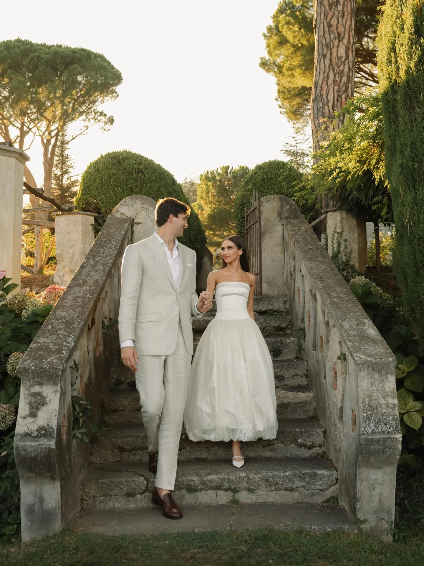 An intimate rehearsal dinner at Mimi&rsquo;s Pizzeria in Ravello featuring authentic pizza, tables covered with jewel-toned flowers and fruit, and @ryan.whitney in a silk tea-length Danielle Frankel gown. 

Planning and design: @The_amalfi_experience