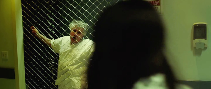  Pay no attention to the madman behind a makeshift fence in the hospital hallway.