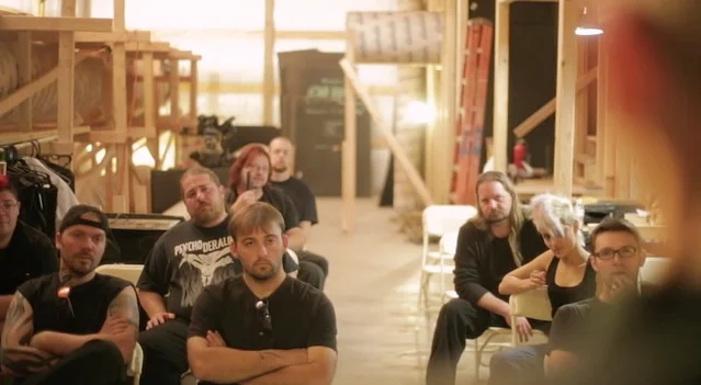  The crew unwinds off stage... er, I mean, the Special Forces team receives their mission briefing.