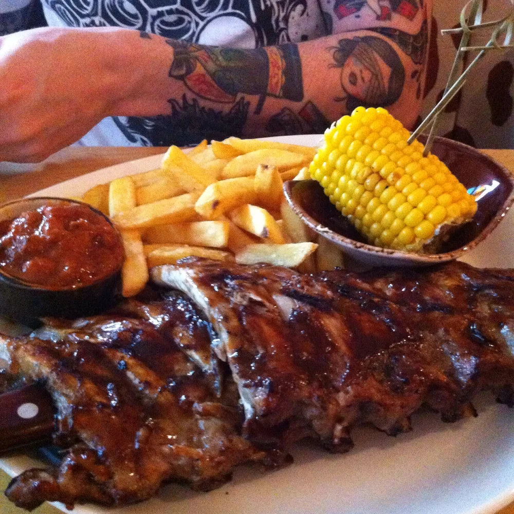 Spur Nachos, Wings, Ribs, Steak & Miley Cyrus Riding a Giant Hot Dog