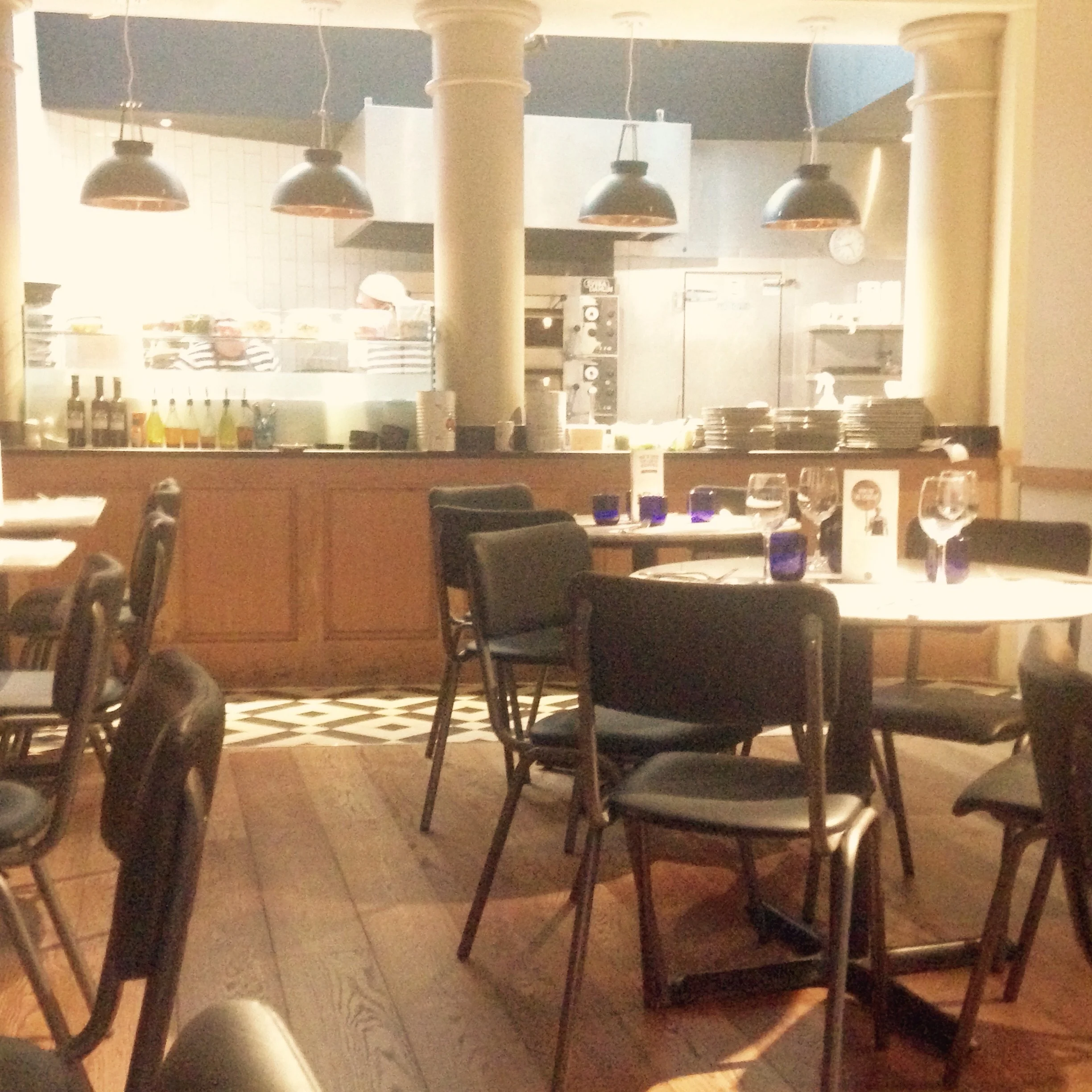 Open kitchen with chefs bustling away