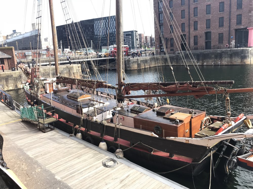  Cool old sail boat inside the dock 