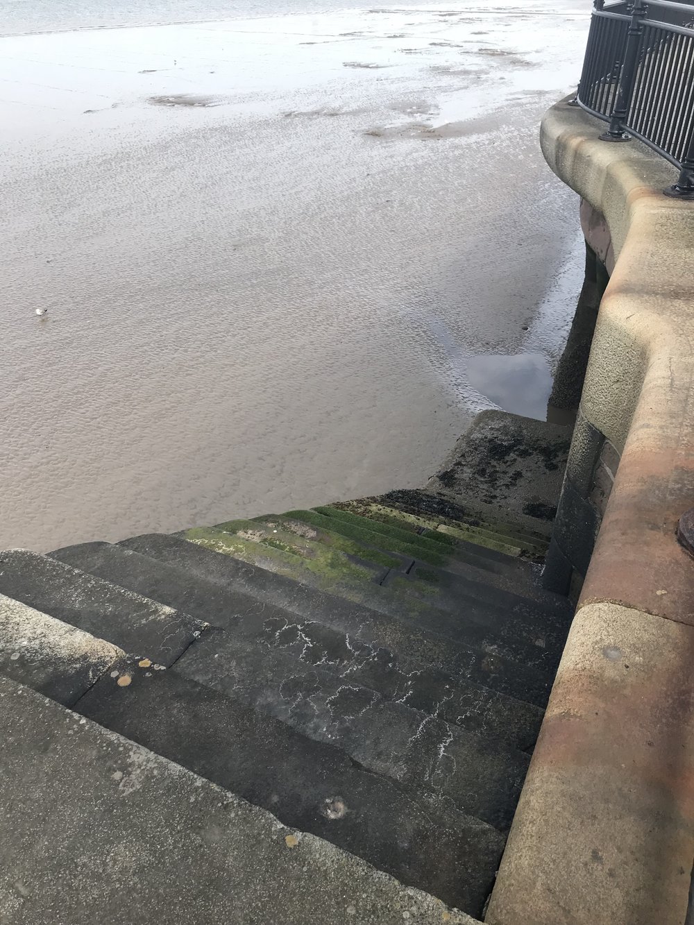 Stairs down to the river bed at low tide