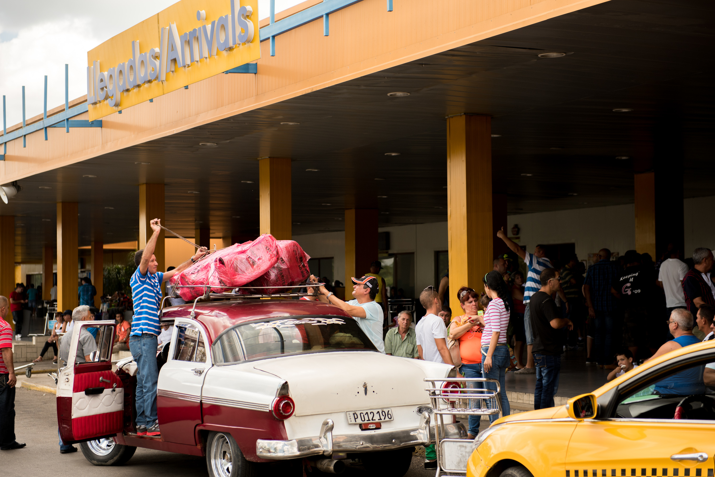 Heat, humidity, and old cars greeted the orchestra members as they arrived in Cuba.