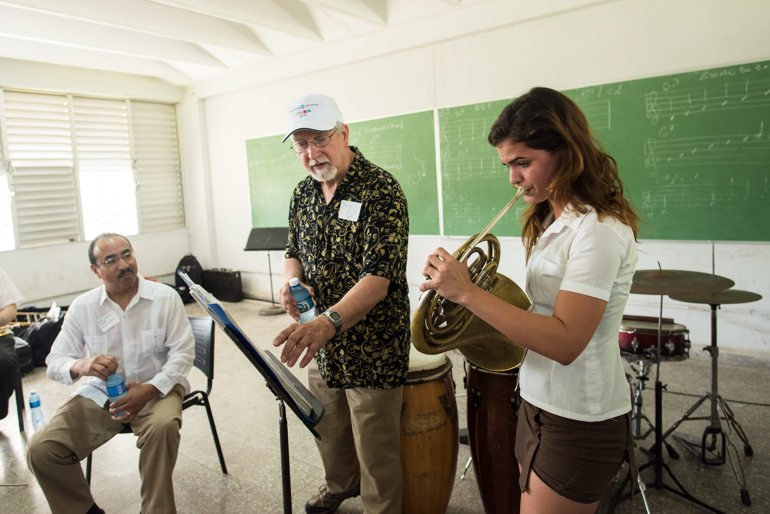 French horn player Herb Winslow worked with a student at the Escuela Nacional de Arte during a master class on Thursday, where trumpeter Manny Laureano translated