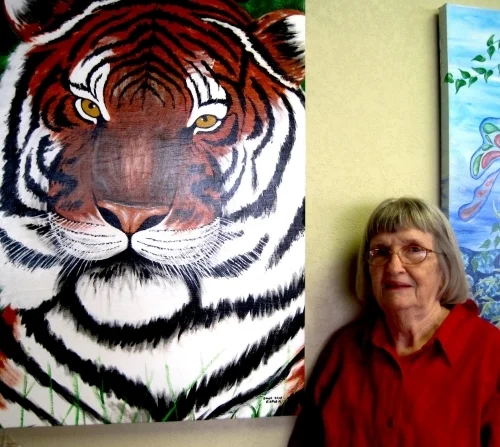 Donna Jean Carver pictured next to her work at the Family Medical Center.