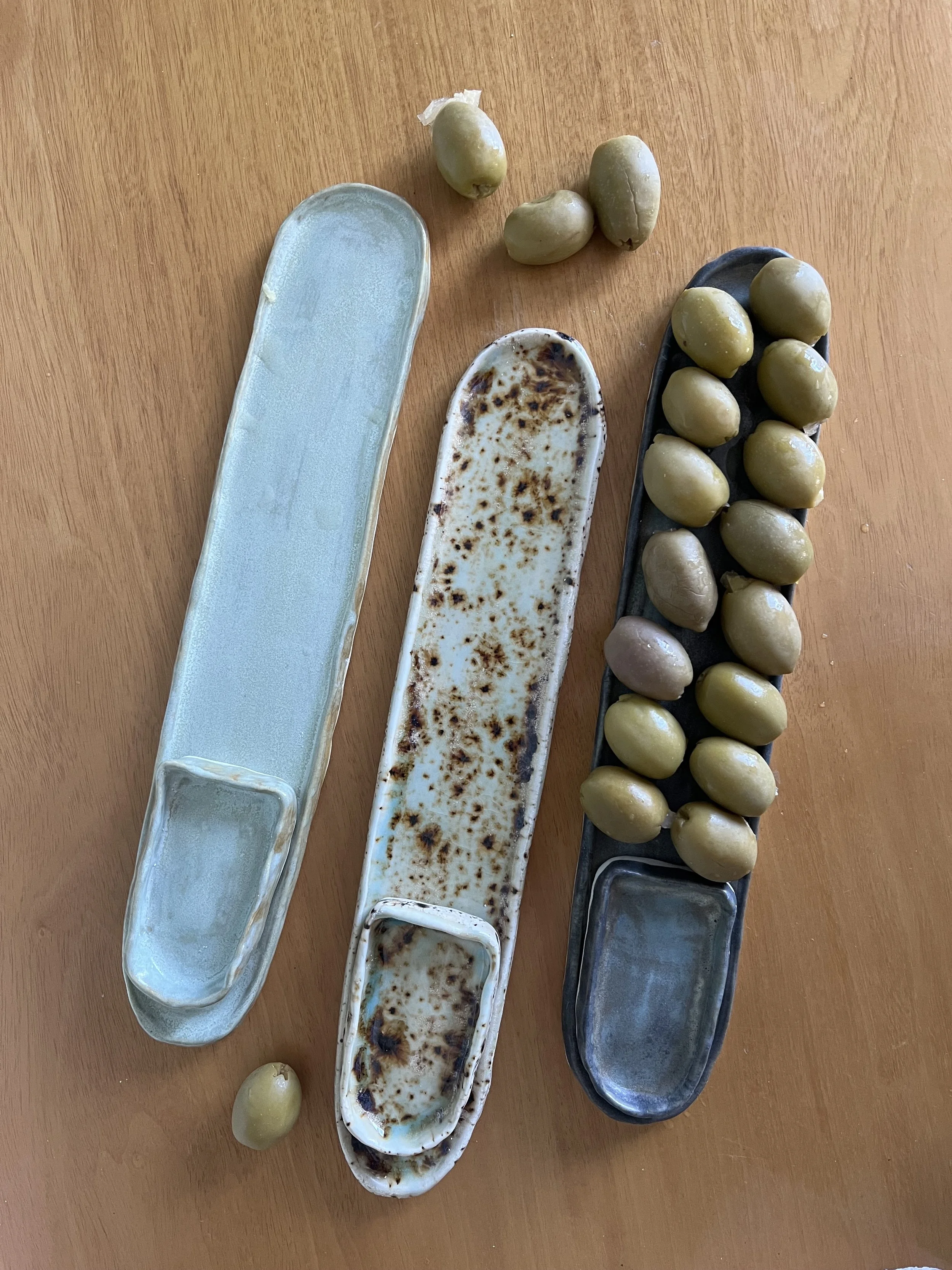 Laura Kissinger olive trays 2025