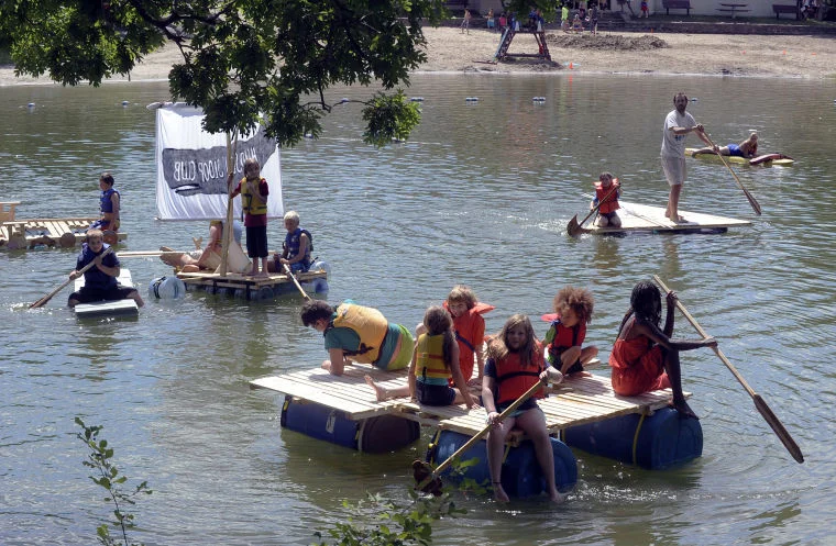 David Lee/Columbia-Greene Media &nbsp;: &nbsp;The Hudson Sloop Club, led by Nick Zachos (standing on the raft on the right), brought their various boats to Oakdale Lake last summer to see how they would float.