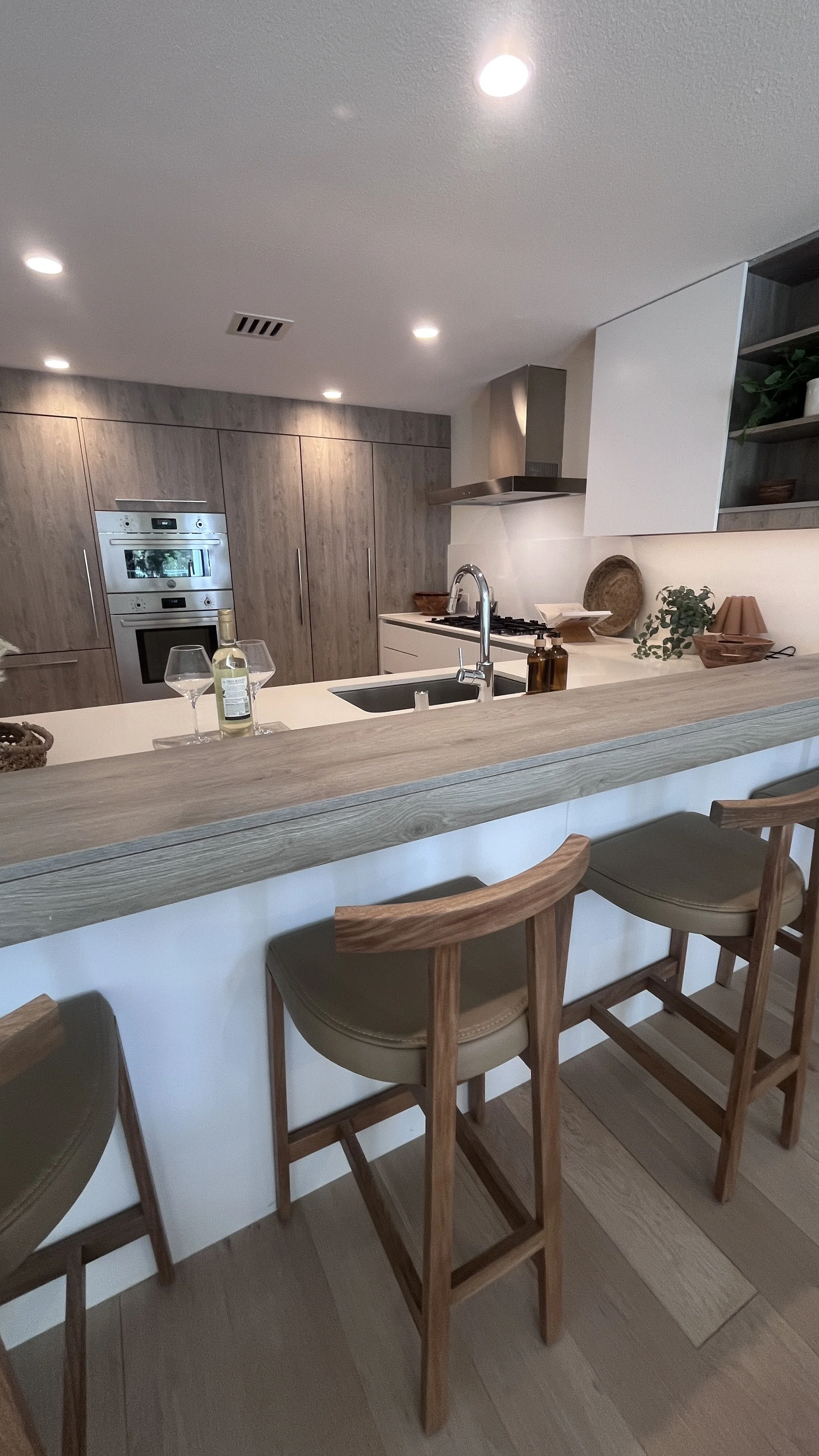 Privé Malibu luxury residence interior with natural finishes and Pacific-facing living space, Malibu California