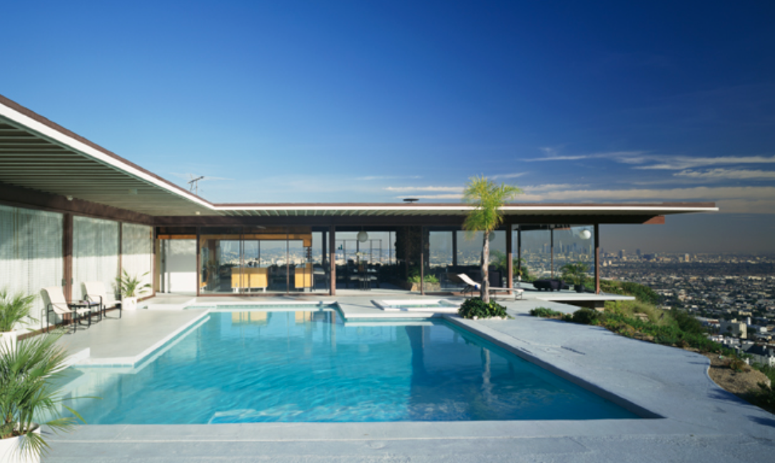 Steel and glass house by architect Pierre Koenig in Los Angeles, exposed steel frame with floor-to-ceiling glass