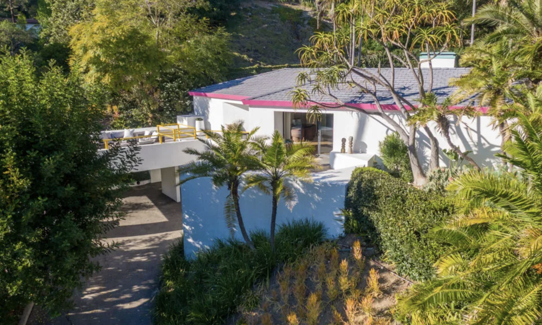 Barragán-influenced 1951 architectural home at 2034 Outpost Drive in Outpost Estates, Hollywood Hills, with terraced gardens and architectural pool