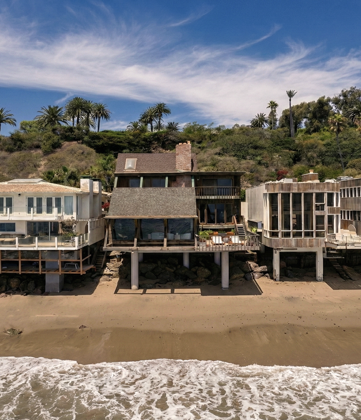 The Bernstein House by Harry Gesner, a wood beach house on the sand at Malibu Cove Colony in Malibu, California.