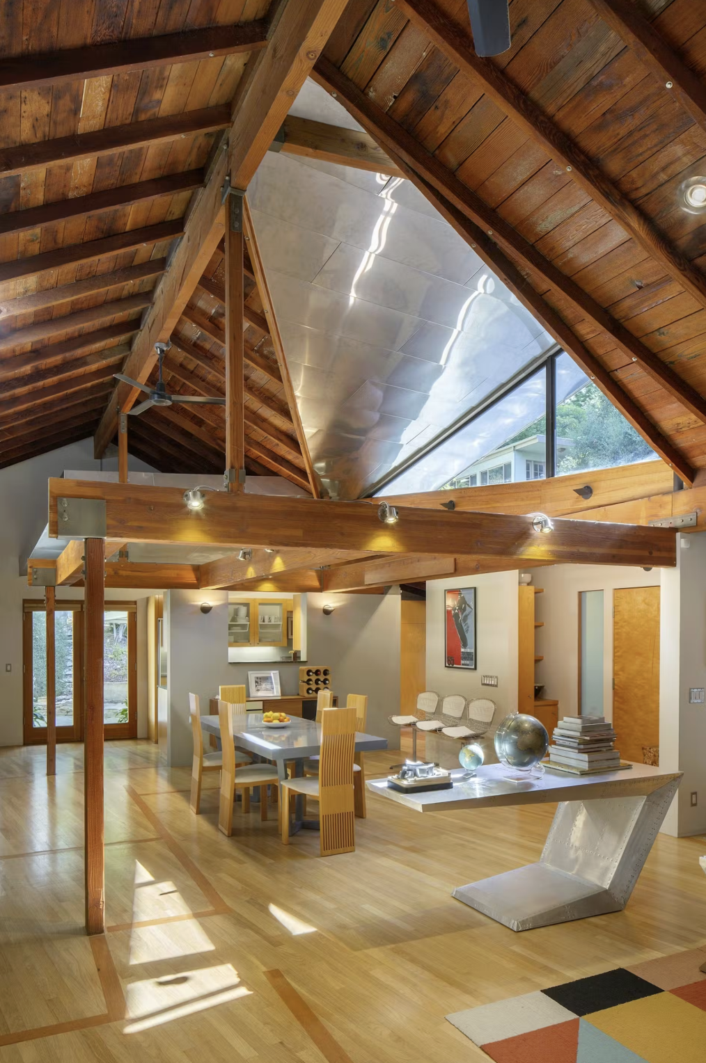 Interior of the Mahler Adams Residence showing high-ceiling open plan living space with hardwood floor inlays, Bel Air, Los Angeles